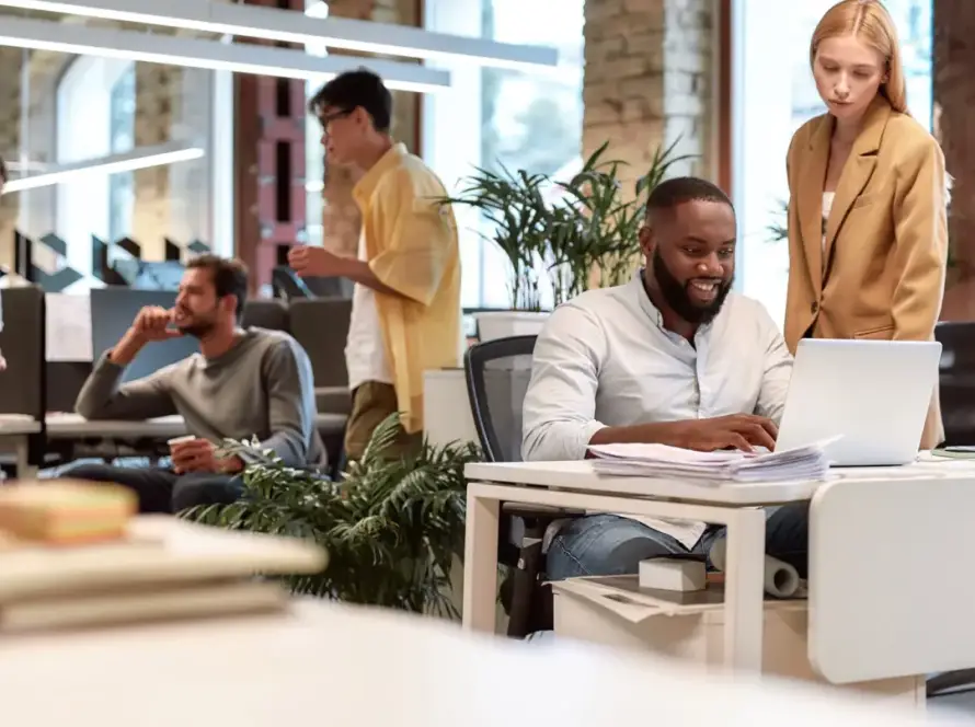 Business owner meeting with a professional website design agency before hiring a web design partner
